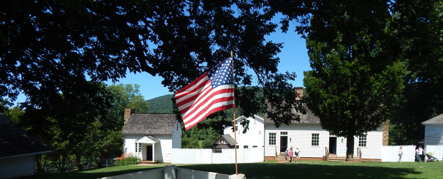 American flag and service outbuildings