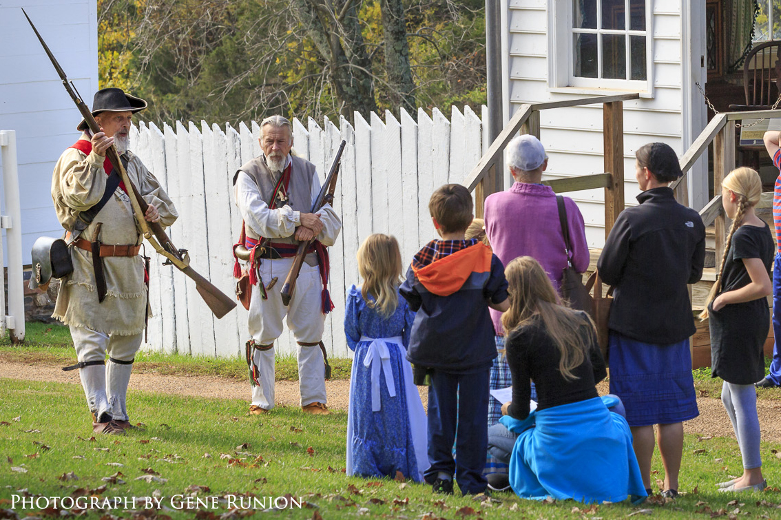 children listening to war of 1812 reenactors